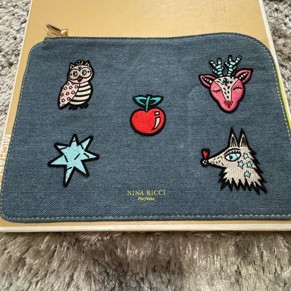 Nina Ricci Blue Cosmetic Bag with Embroidered Designs - Picture 3 of 7